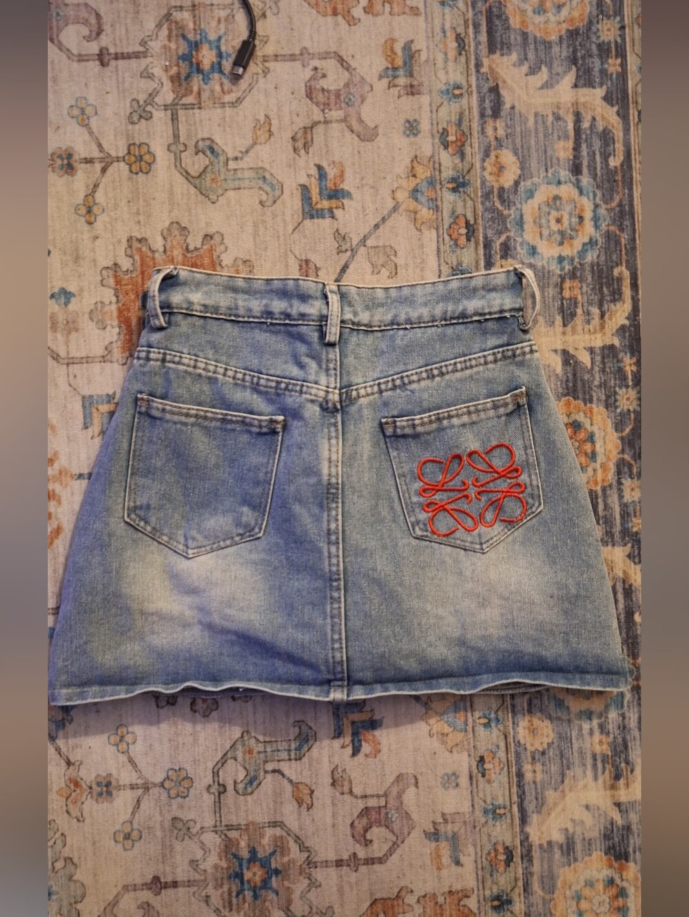 Loewe (LIKE)Light Blue Denim Mini Skirt with Red Back-Pocket Embroidery